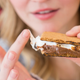 woman holding gooey smore
